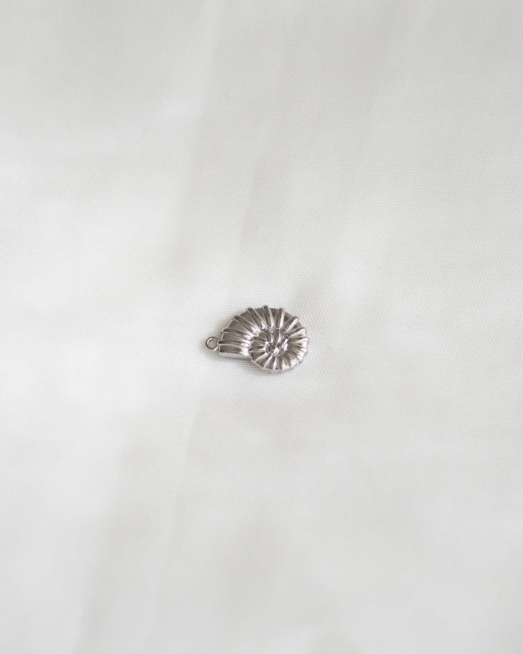 Charm FOSSIL